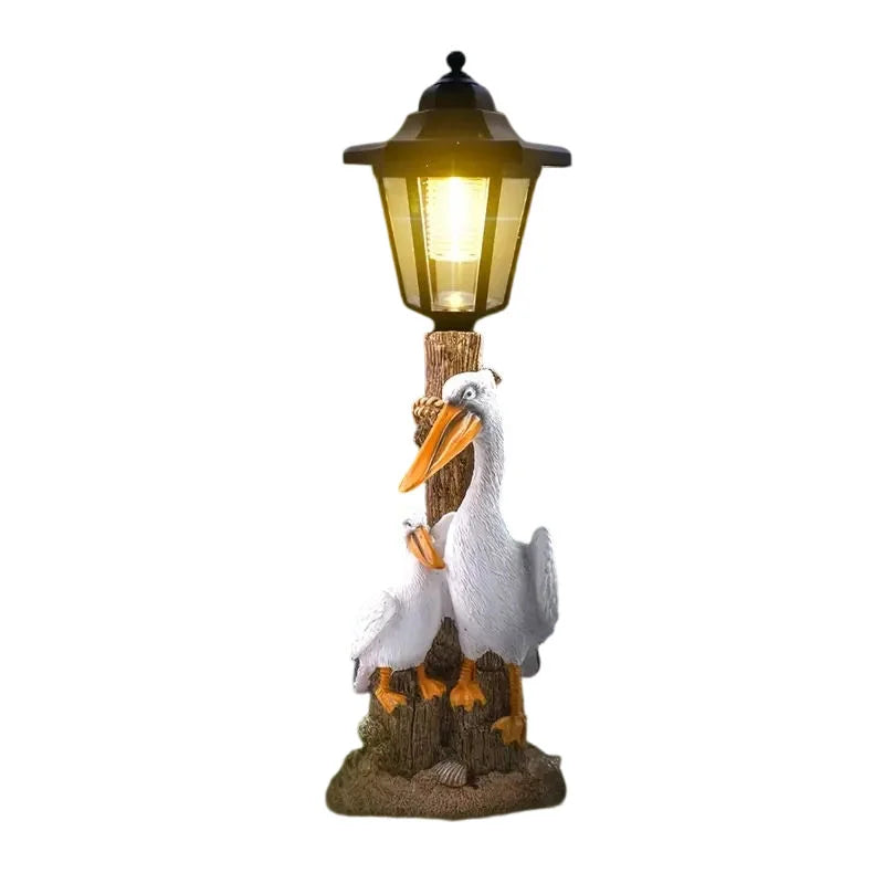 White Orange Resin Pelican Solar Lamp Hand-painted Artistic Design Dual-Purpose Outdoor Lighting for Garden Paths Landscape