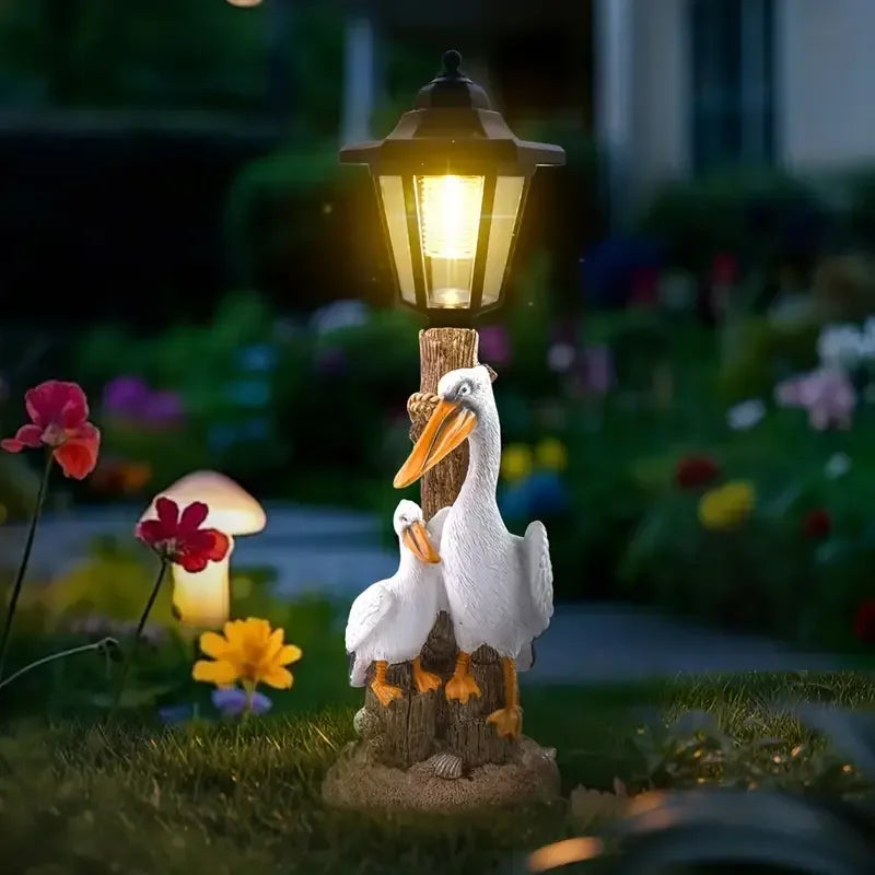 White Orange Resin Pelican Solar Lamp Hand-painted Artistic Design Dual-Purpose Outdoor Lighting for Garden Paths Landscape