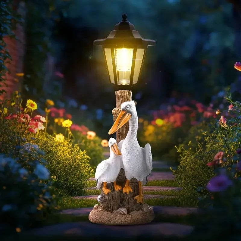 White Orange Resin Pelican Solar Lamp Hand-painted Artistic Design Dual-Purpose Outdoor Lighting for Garden Paths Landscape